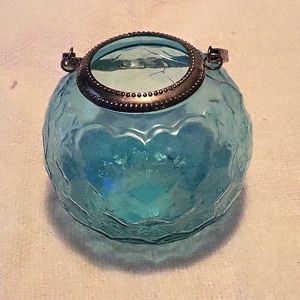 Pretty blue glass container.